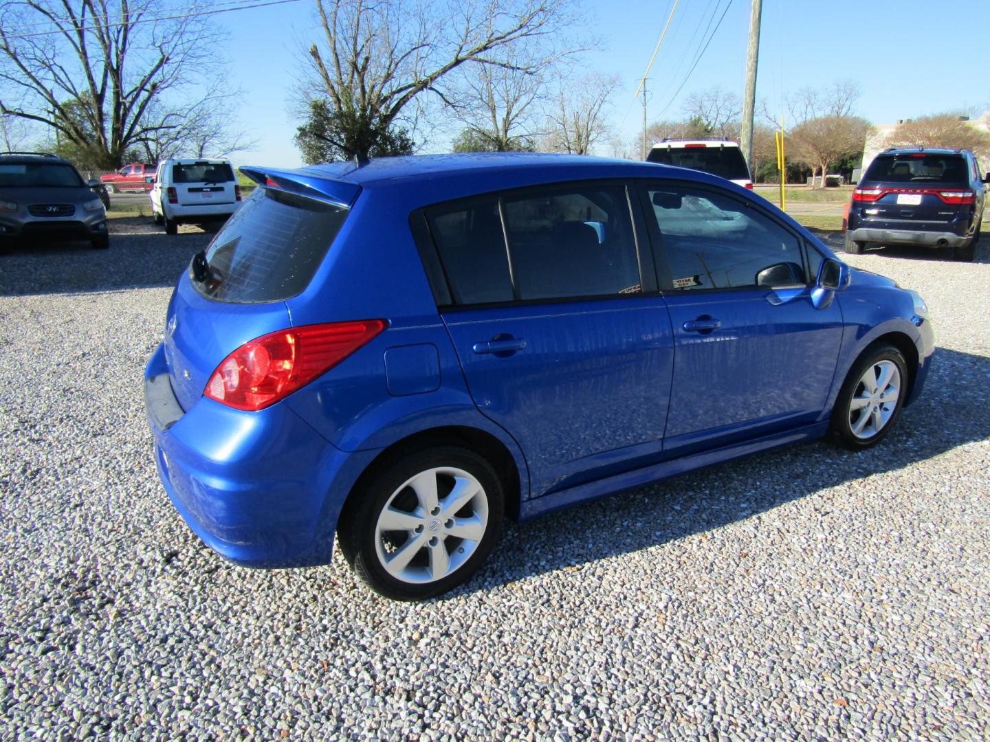 2012 Blue /Black Nissan Versa 1.8 SL Hatchback (3N1BC1CP4CK) with an 1.8L L4 DOHC 16V engine, Automatic transmission, located at 15016 S Hwy 231, Midland City, AL, 36350, (334) 983-3001, 31.306210, -85.495277 - Photo#7